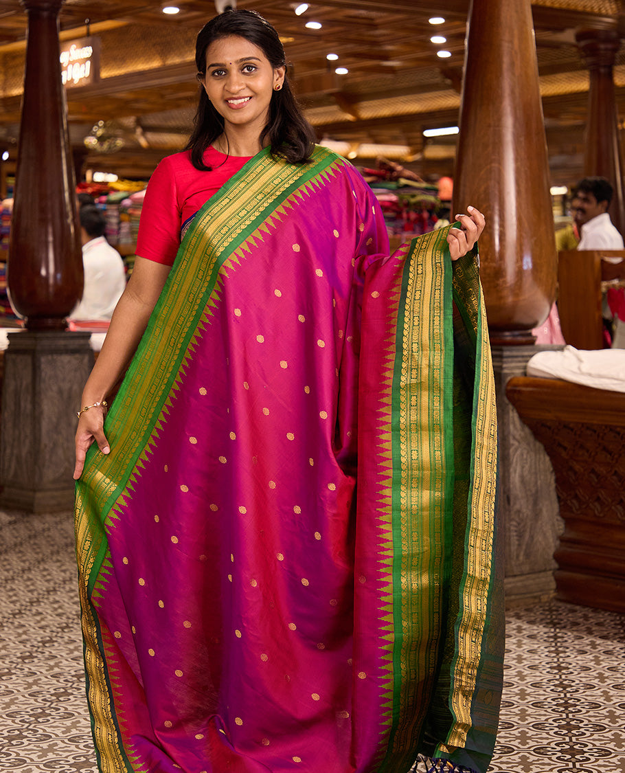 Pink chakram buttas gadwal silk saree, contrast thazampoo rekku border of manga mokku, star kamalam, and vanki designs