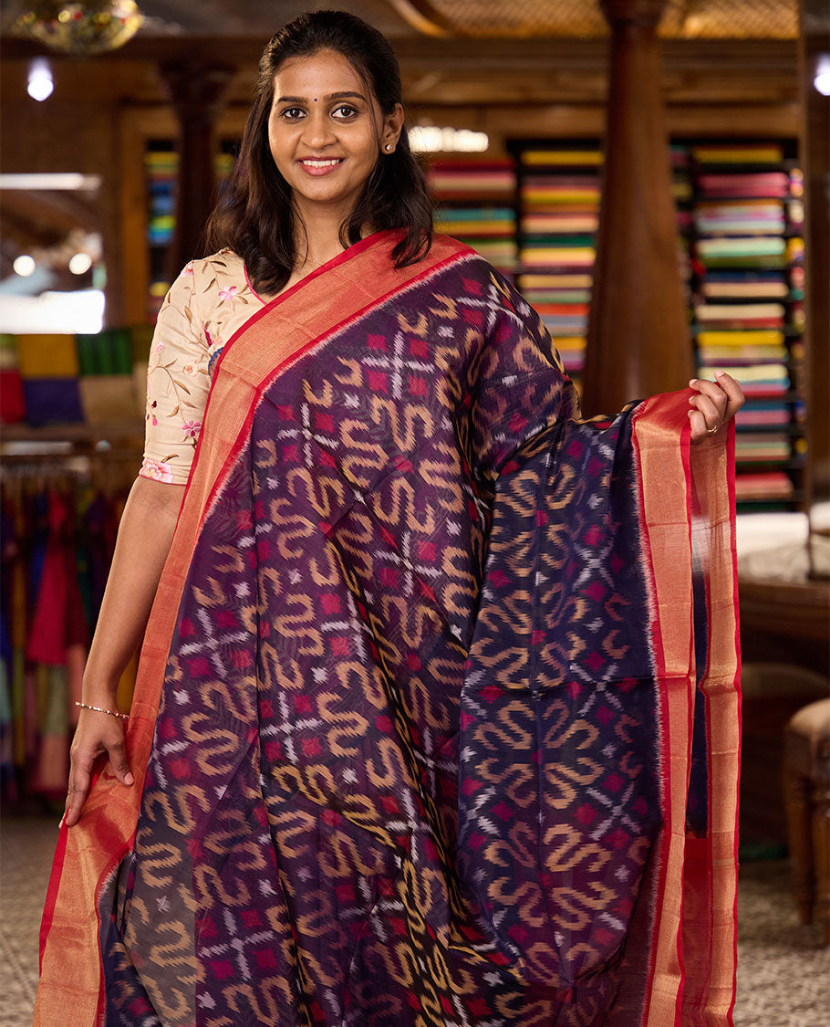 Blue Pochampally Ikkat-style designed silk cotton saree, contrast bavanji border, and ikkat design pallu