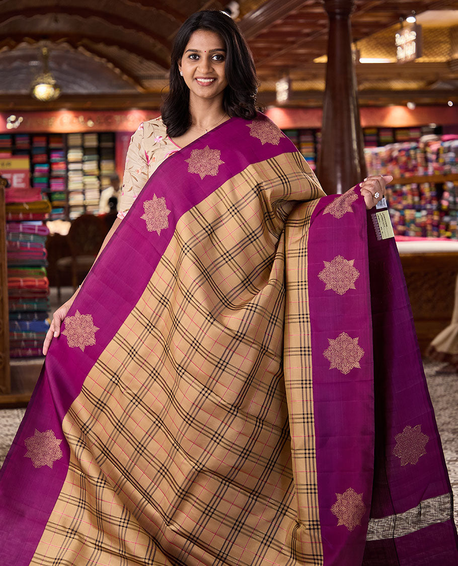 Dark sandal burberry-style checked Kanchipuram silk saree, contrast kolam motifs, zari border, and zari design pallu