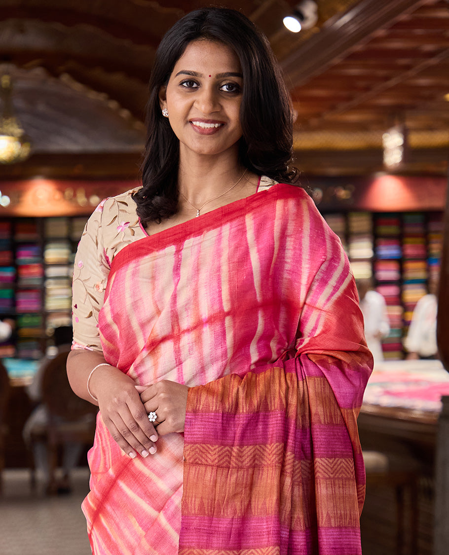 Multi-color shibori printed tussar silk saree, plain border, and pallu of temple, and chevron designs