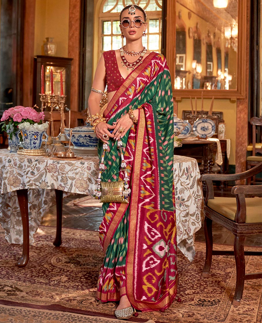 Green ikkat buttas designer catalog saree, contrast chevron ikkat patterned border, pallu of ikkat design