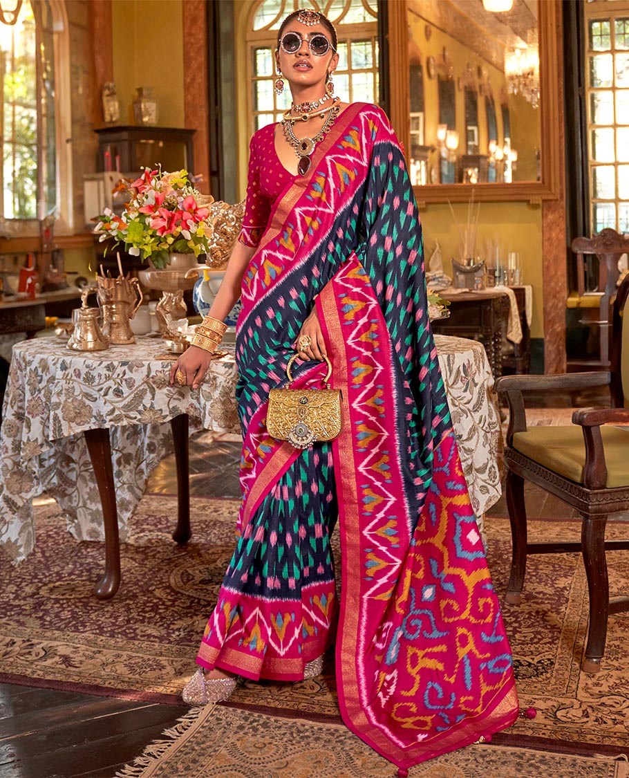 Navy blue ikkat buttas designer catalog saree, contrast chevron ikkat patterned border, pallu of ikkat design