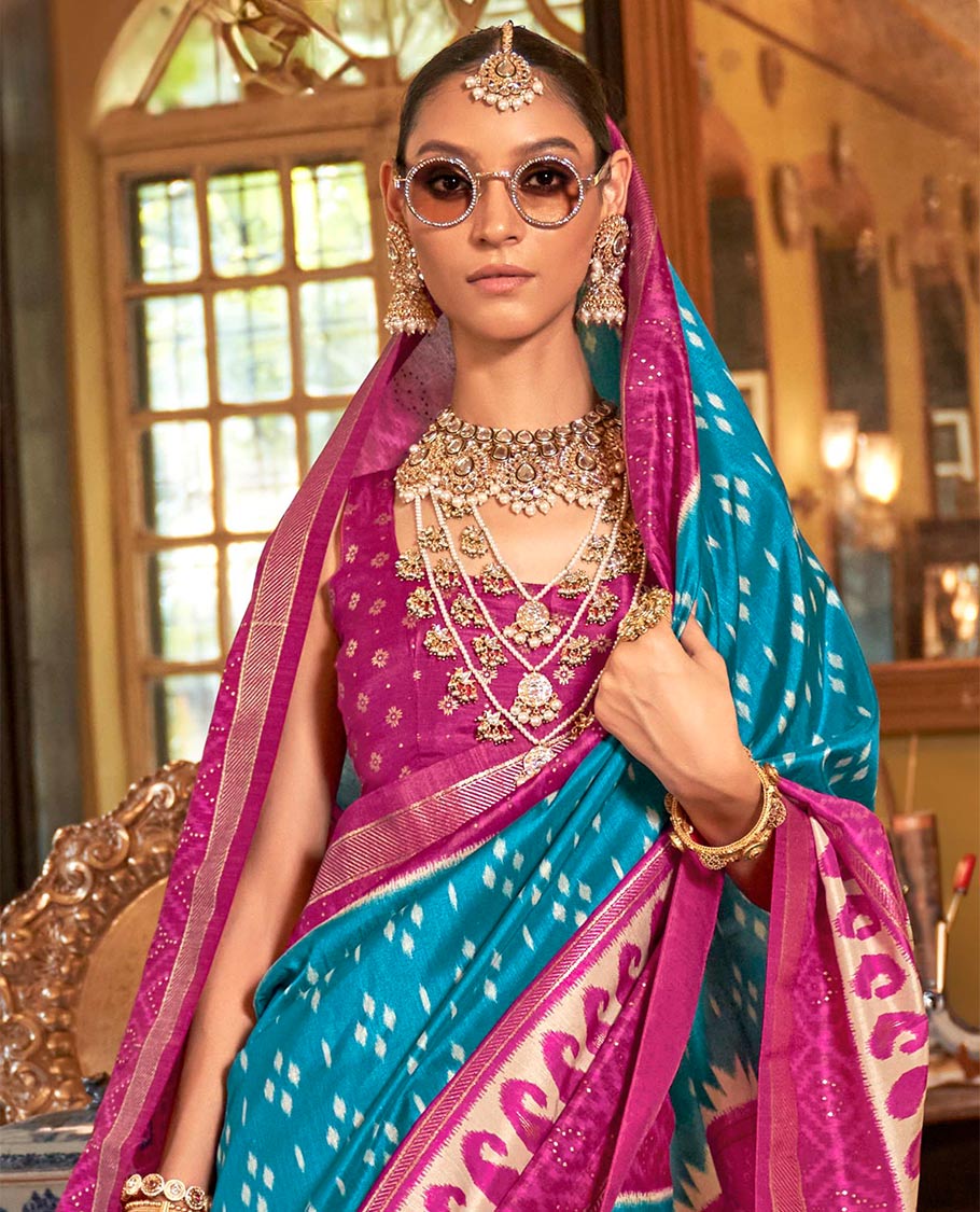 Sky blue diamond buttas patola designer catalog saree, contrast ikkat geometric and paisleys border and pallu of ikkat jaal design