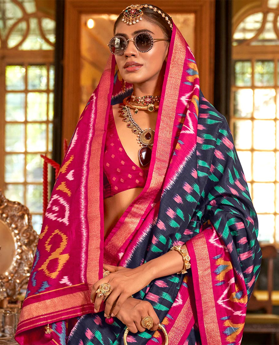 Navy blue ikkat buttas designer catalog saree, contrast chevron ikkat patterned border, pallu of ikkat design