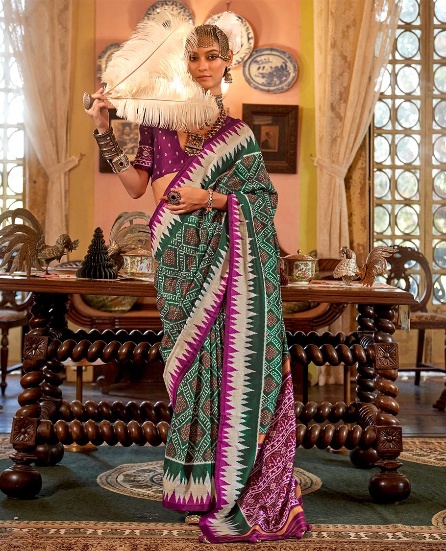 Green diamond patterned patola designer catalog saree, contrast temple border, and patola design pallu