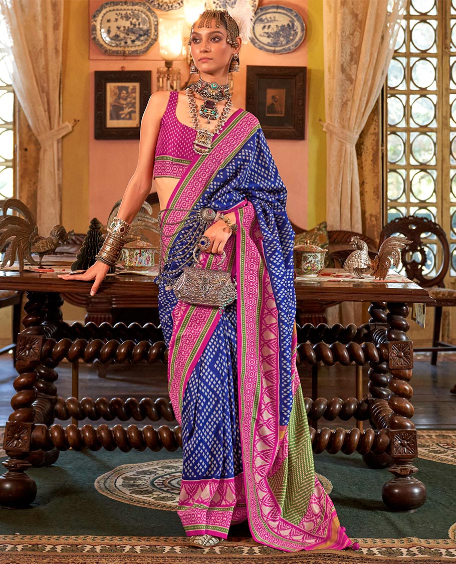 Royal blue diamond patola designer catalog saree, contrast patola border, and intricately patola designed pallu