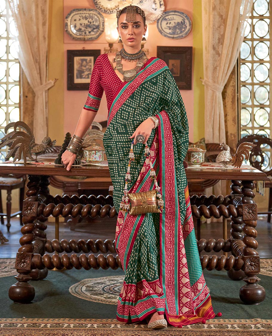 Green diamond patola designer catalog saree, contrast patola border, and intricately patola designed pallu