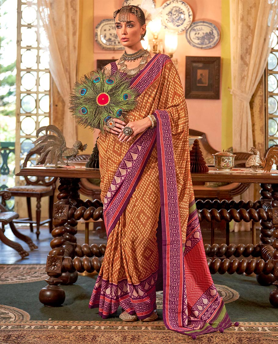 Gold diamond patola designer catalog saree, contrast patola border, and intricately patola designed pallu
