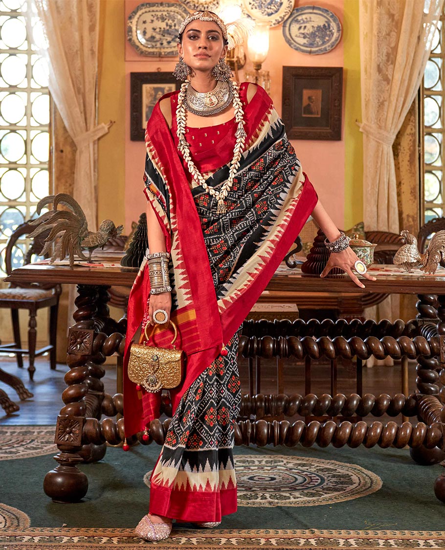 Black diamond patterned patola designer catalog saree, contrast temple border, and patola design pallu