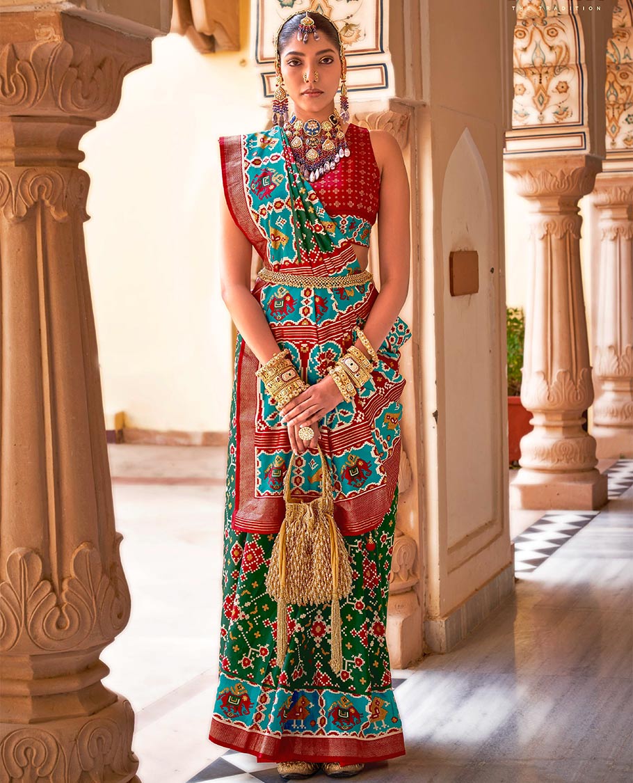 Green intricate patola patterned designer catalog saree, contrast border and pallu of patola designs