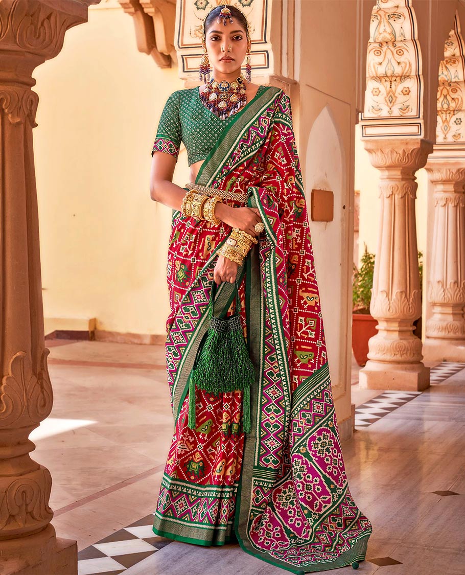 Red buttas enclosed jaal patterned patola designer catalog saree, contrast border and pallu of patola designs