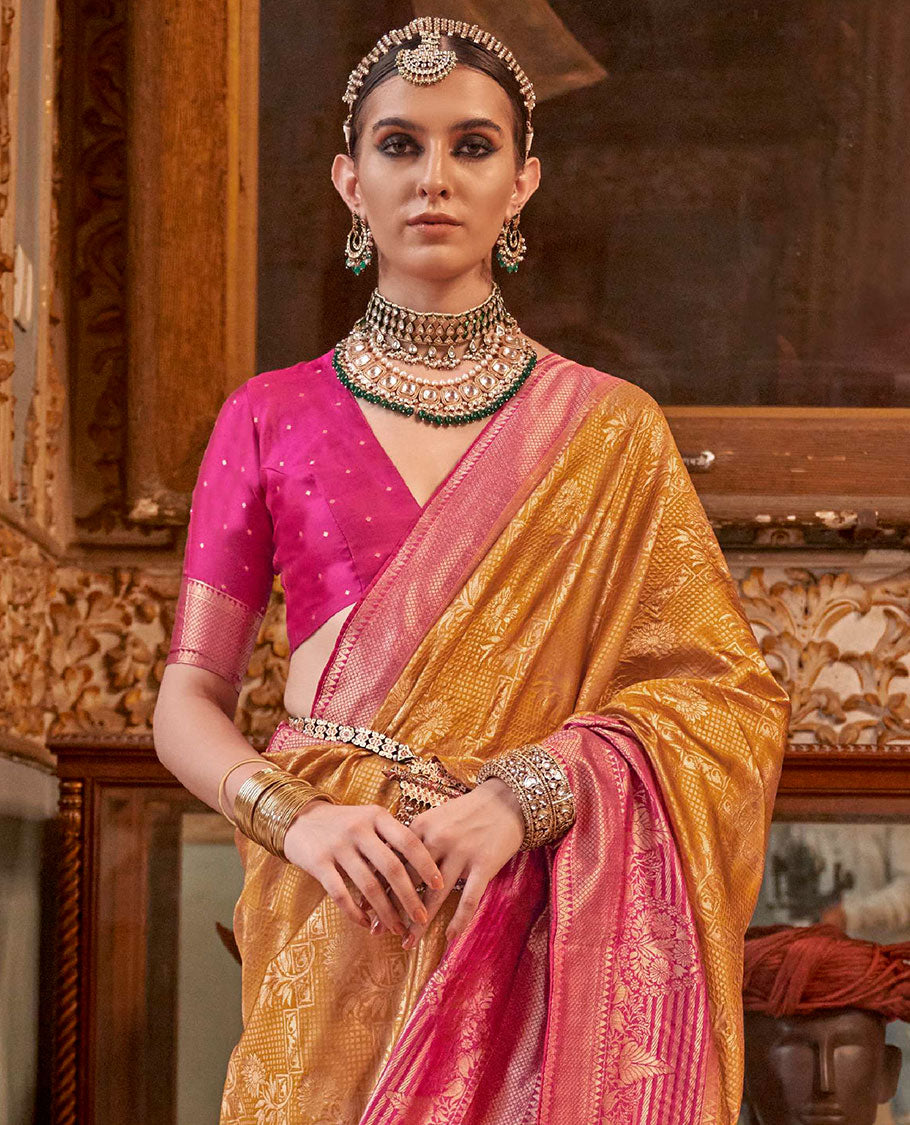 Orange zari jacquard designer saree, contrast zari border, and contrast intricately woven pallu