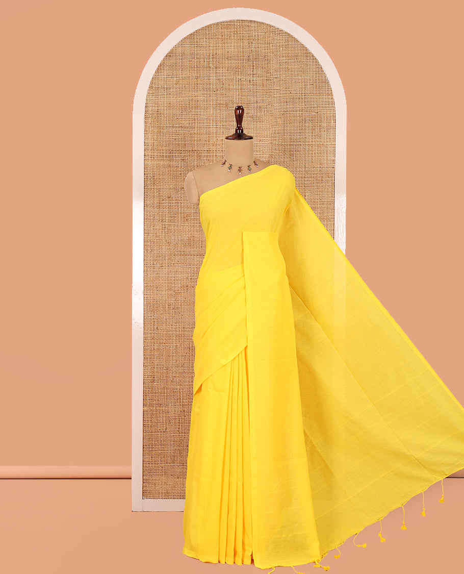 Borderless Yellow Plain Khadi Cotton Saree, a Self-Pallu with Tassels, and a Matching Blouse