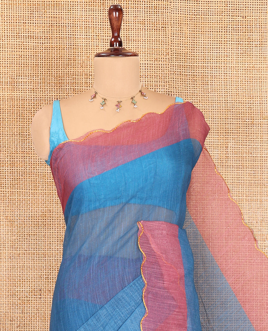 Dusky Blue Plain Linen Cotton Saree, Contrast Plain Scallop Border, a Self-Pallu, and Contrast Kalamkari Printed Blouse