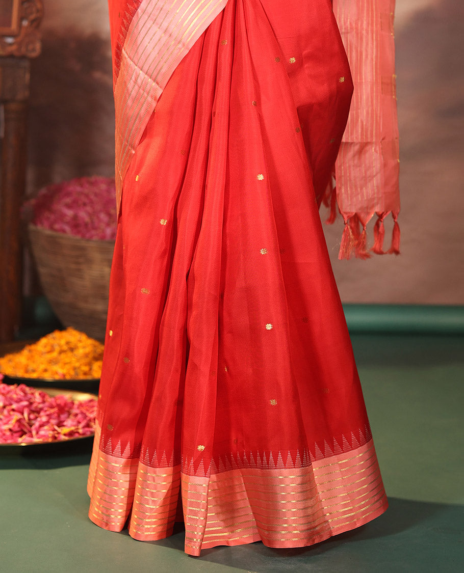 Red Vasundhara Silk Saree, Gracefully Woven with Kamalam Buttas on Its Body, Complemented by a Captivating Contrast Thazampoo Rekku Border of Banaras Designs, Zari-Decked Up Pallu, and Paired with a Contrast Blouse