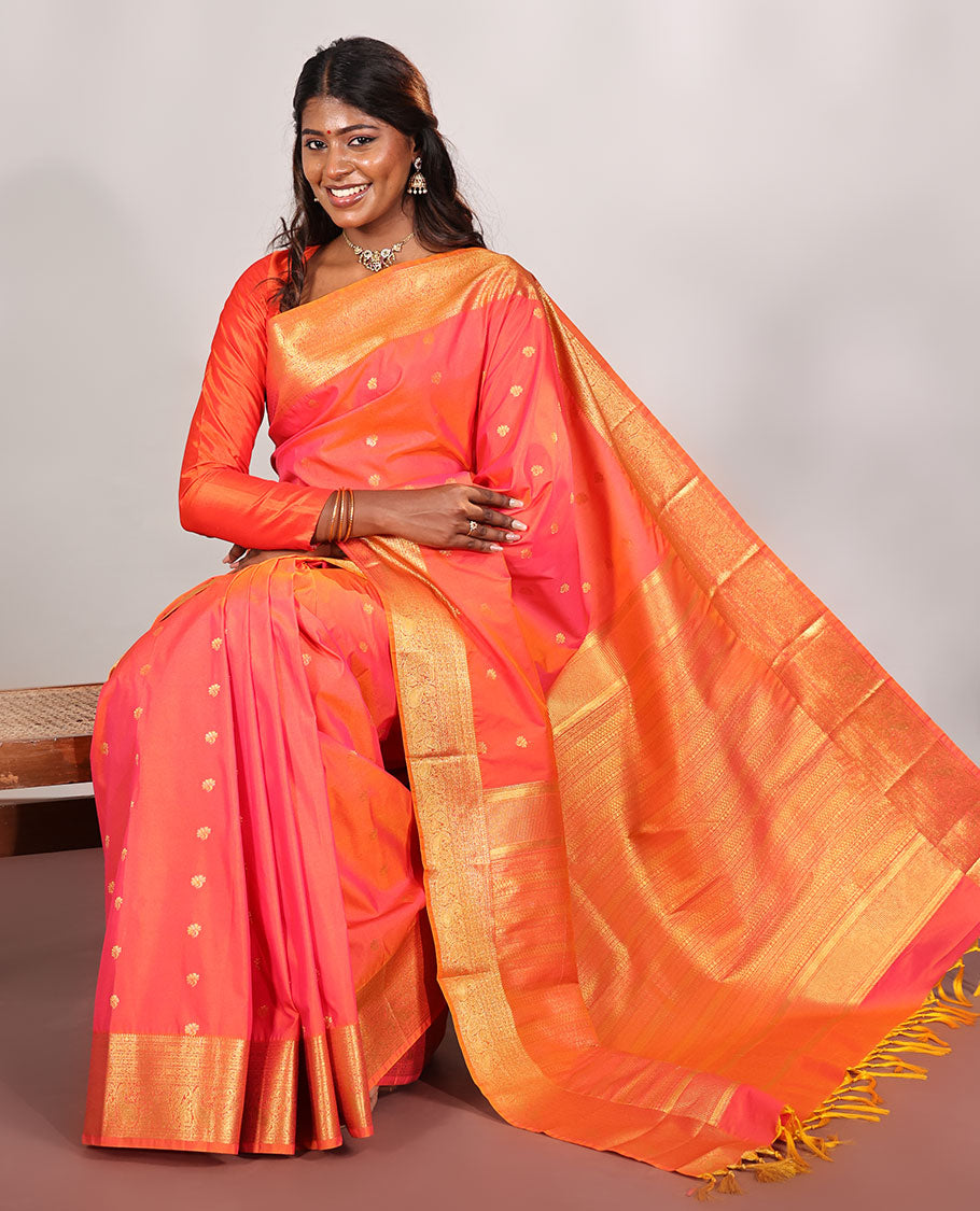 Orange Budget Silk Saree, Meticulously Woven with Zari Buttas on Its Body, Highlighted by a Traditional Zari Design Woven Border, Intricately Designed Pallu, and Paired with a Matching Blouse