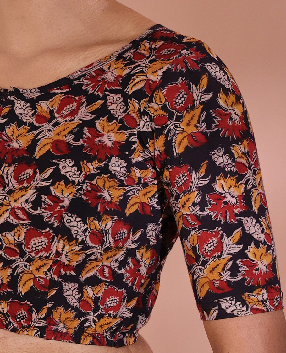Black Readymade Blouse Artfully Detailed with Floral Motifs Print, Featuring Front Round Neck, Back Boat Neck, and Half-Sleeves