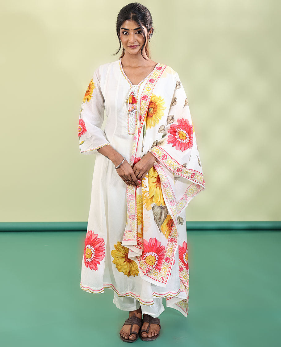 White Cotton Readymade Suit, Features Sunflower Print with Outline Embroidered V-neck 3/4 th Sleeved Umbrella Top, a Subtle Straight-Cut Pants, and a Floral Print-Embroidered Dupatta