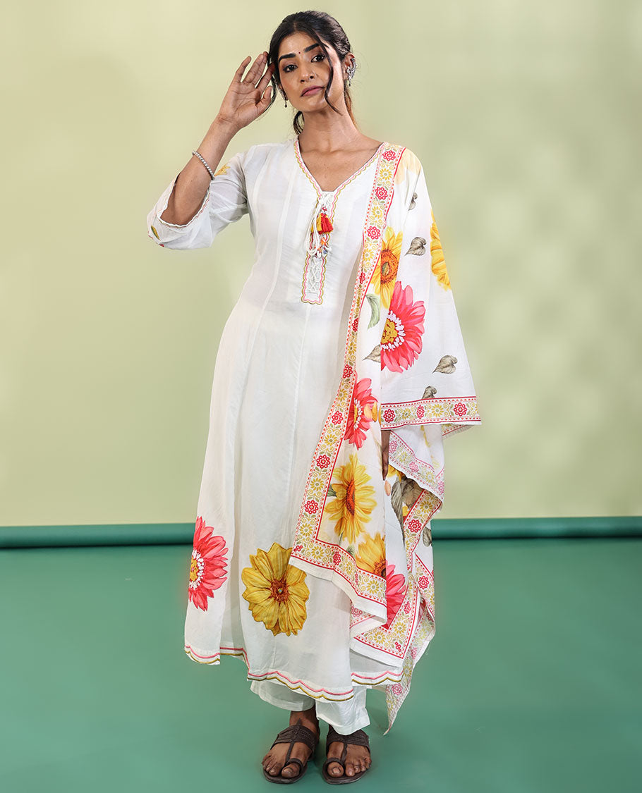 White Cotton Readymade Suit, Features Sunflower Print with Outline Embroidered V-neck 3/4 th Sleeved Umbrella Top, a Subtle Straight-Cut Pants, and a Floral Print-Embroidered Dupatta