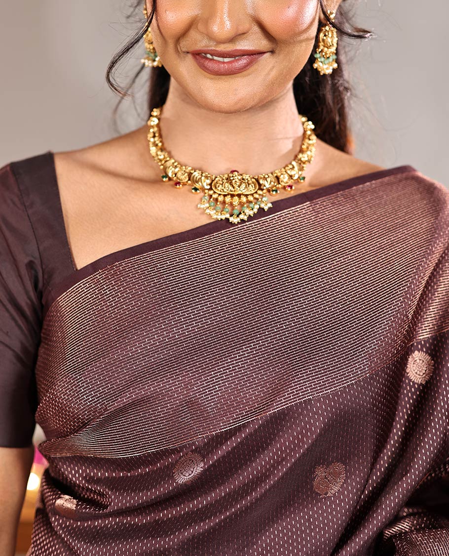 Coffee Brown Vasundhara Silk Saree, Finely Crafted with Raindrop Buttas, and Annam Chakram Bu\ttas on Its Body, Highlighted by a Zari Geometric-Textured Border, Gleaming Copper-Colored Zari Pallu of Jaal Designs, and Paired with a Matching Blouse