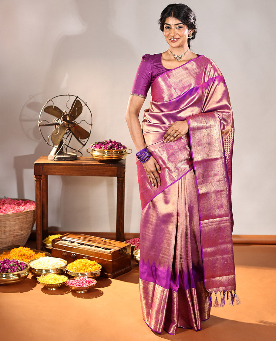 Scintillating Pink Vasundhara Lite-Silk Mix Saree, Gleamed Up with Zari on Its Body, Highlighted by Thazampoo Rekku Border of Neli, Paisa, Cross Kamalam, and Kodi Visiry Designs, a Grand Geometric-Patterned Pallu, and Paired with a Matching Blouse