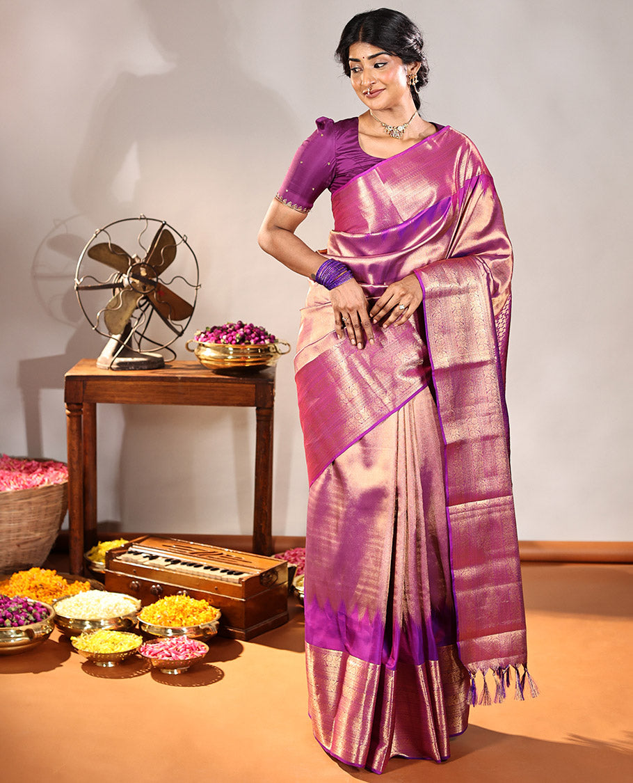 Scintillating Pink Vasundhara Lite-Silk Mix Saree, Gleamed Up with Zari on Its Body, Highlighted by Thazampoo Rekku Border of Neli, Paisa, Cross Kamalam, and Kodi Visiry Designs, a Grand Geometric-Patterned Pallu, and Paired with a Matching Blouse