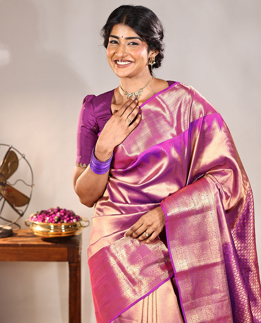 Scintillating Pink Vasundhara Lite-Silk Mix Saree, Gleamed Up with Zari on Its Body, Highlighted by Thazampoo Rekku Border of Neli, Paisa, Cross Kamalam, and Kodi Visiry Designs, a Grand Geometric-Patterned Pallu, and Paired with a Matching Blouse