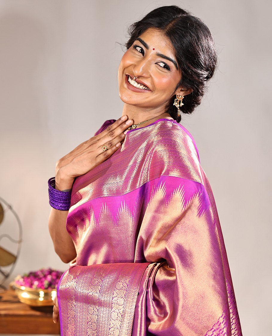 Scintillating Pink Vasundhara Lite-Silk Mix Saree, Gleamed Up with Zari on Its Body, Highlighted by Thazampoo Rekku Border of Neli, Paisa, Cross Kamalam, and Kodi Visiry Designs, a Grand Geometric-Patterned Pallu, and Paired with a Matching Blouse