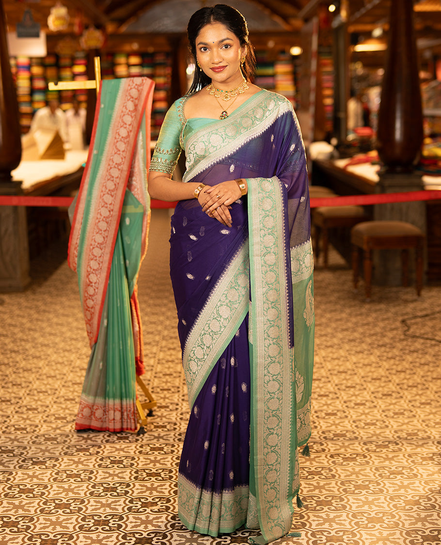 Purple Banarasi Georgette Saree, Accentuated with Zari Buttas All Over Its Body, Complemented by a Contrast Floral Creeper Design Border, Pallu of Paisleys, and Paired with a Contrast Blouse