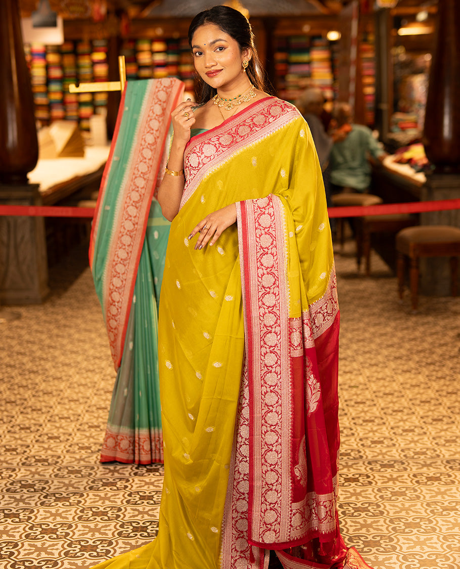 Mustard Banarasi Georgette Saree, Ornamented with Zari Buttas All Over Its Body, Complemented by a Contrast Floral Creeper Design Border, Pallu of Paisleys, and Paired with a Contrast Blouse