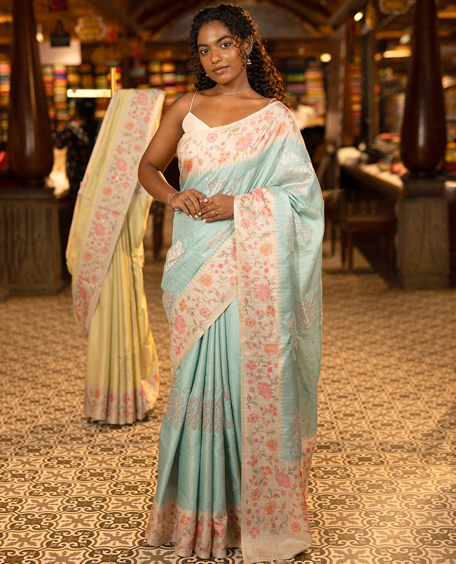 Sky Blue Fancy Tussar Silk Saree, Gleamed Up with Small Gold Buttas, and Applique Embroidery on Its Body, Complemented by a Contrast Temple Floral Creeper Printed Border, Pallu of Floral Creeper Print, and Paired with a Contrast Blouse