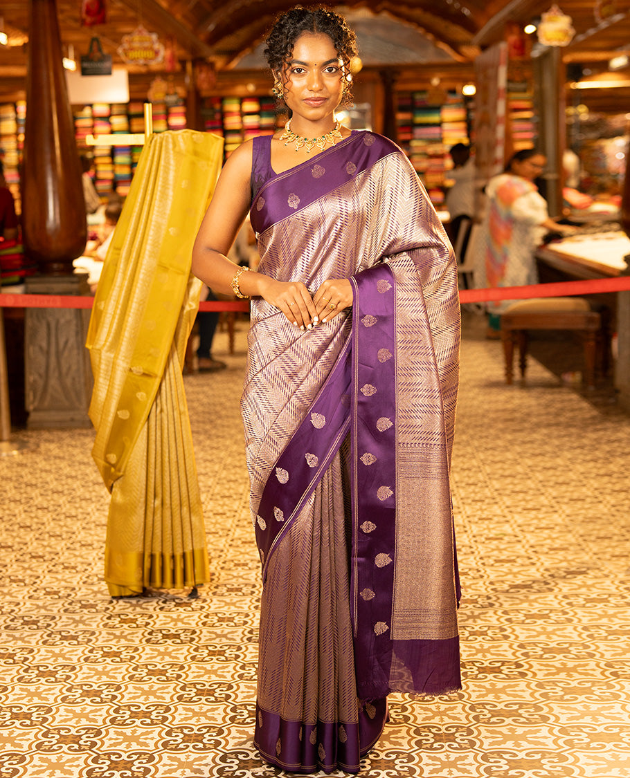 Purple Russian Dola Silk Saree, Meticulously Crafted with Zari Zig-Zag Jacquard on Its Body, Highlighted by Zari Buttas Woven Satin Border, Intricately Designed Pallu, and Paired with a Matching Blouse