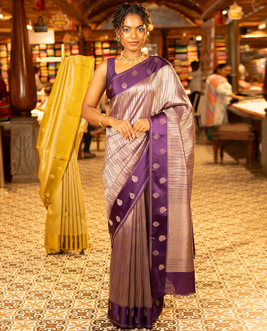 Purple Russian Dola Silk Saree, Meticulously Crafted with Zari Zig-Zag Jacquard on Its Body, Highlighted by Zari Buttas Woven Satin Border, Intricately Designed Pallu, and Paired with a Matching Blouse