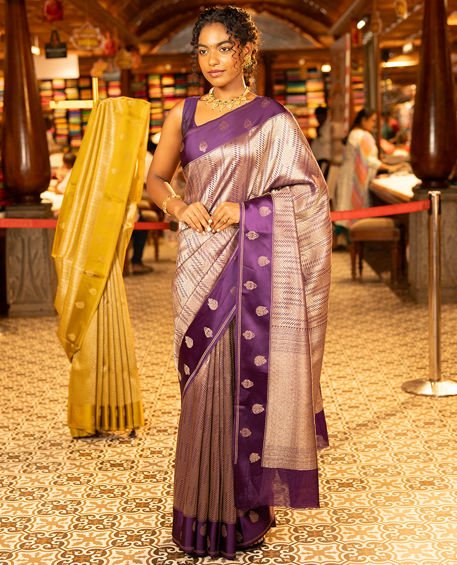 Purple Russian Dola Silk Saree, Meticulously Crafted with Zari Zig-Zag Jacquard on Its Body, Highlighted by Zari Buttas Woven Satin Border, Intricately Designed Pallu, and Paired with a Matching Blouse