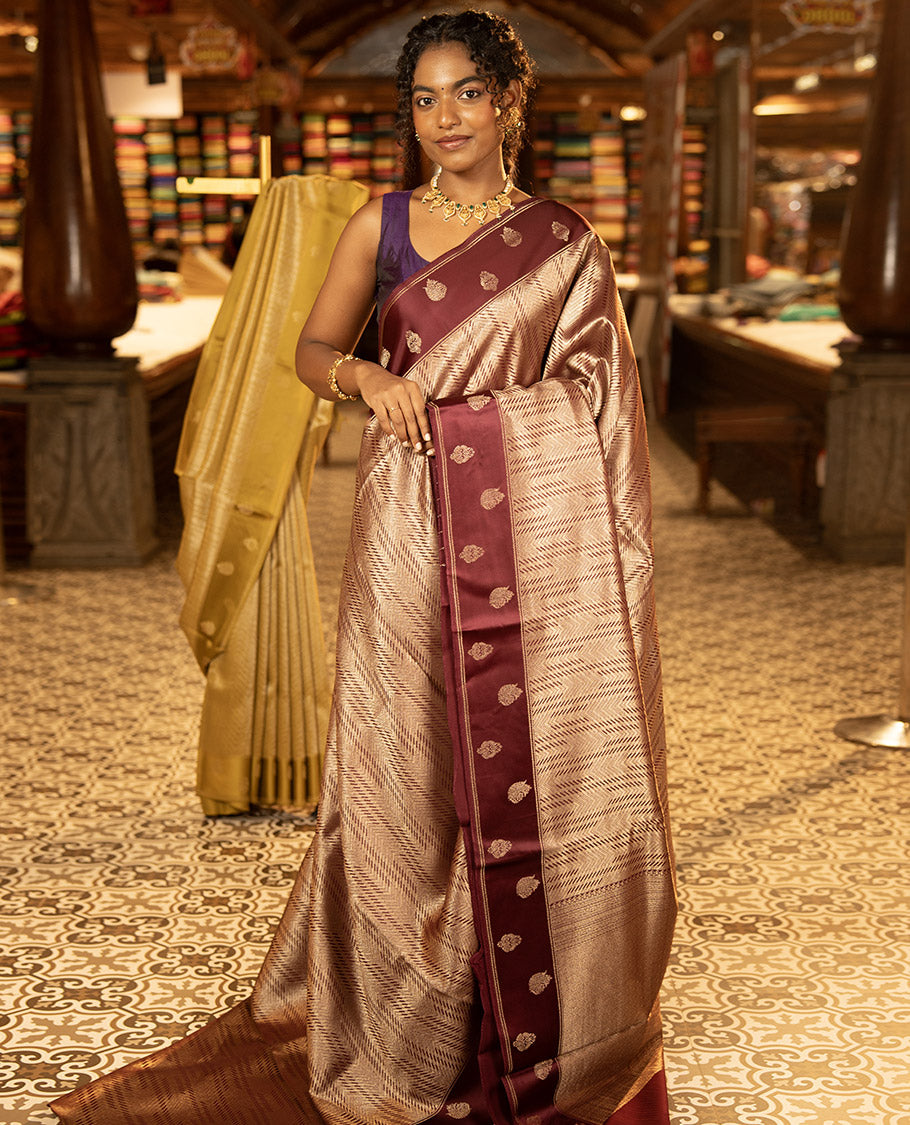 Magenta Pink Russian Dola Silk Saree, Gracefully Embellished with Zari Zig-Zag Jacquard on Its Body, Highlighted by Zari Buttas Woven Satin Border, Intricately Designed Pallu, and Paired with a Matching Blouse