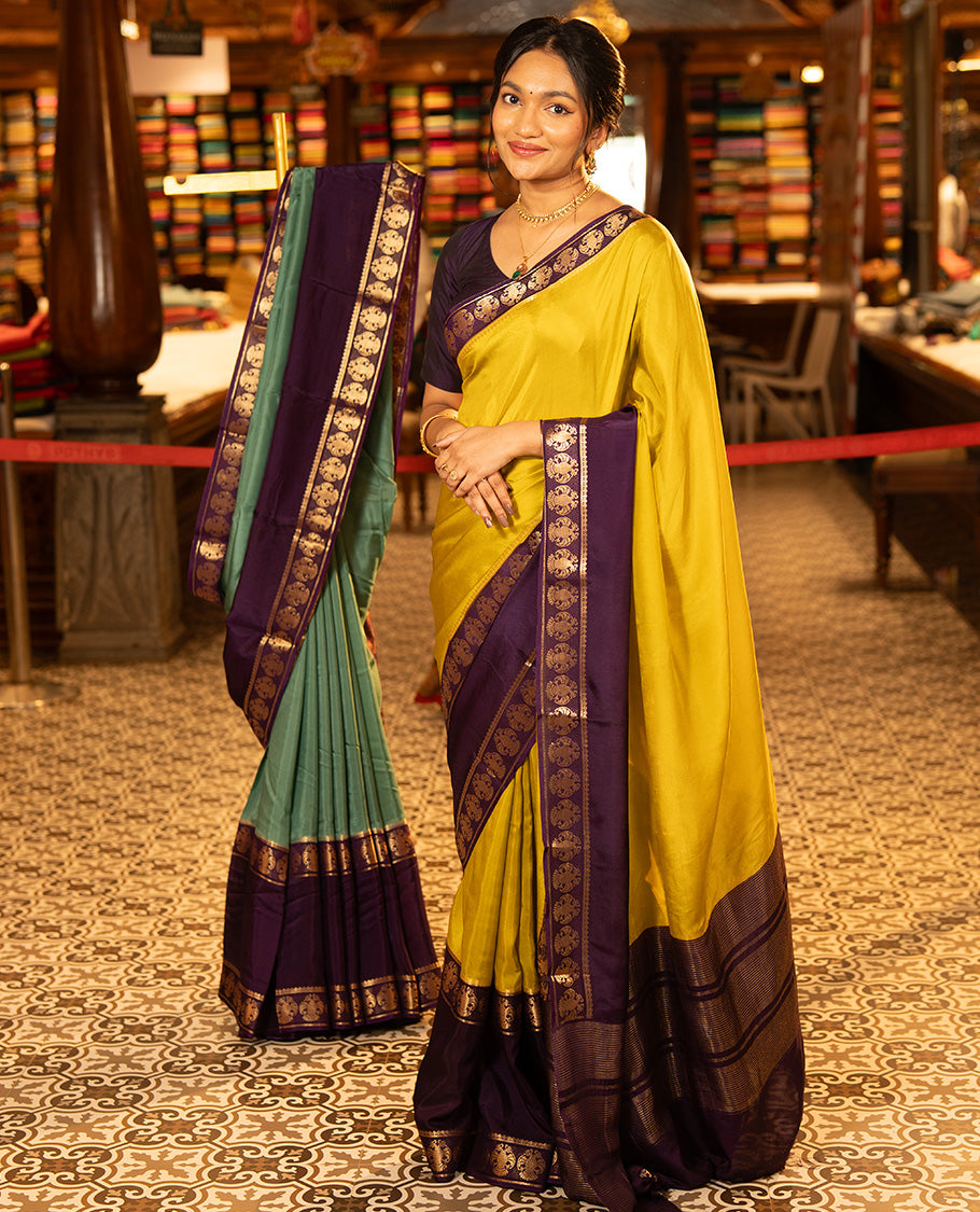 Mustard Plain Dola Silk Saree, Complemented by Contrast Rettai Pettu Ganda Berunda Motifs, Zari Border, Gleaming Zari Striped Pallu, and Paired with a Contrast Blouse