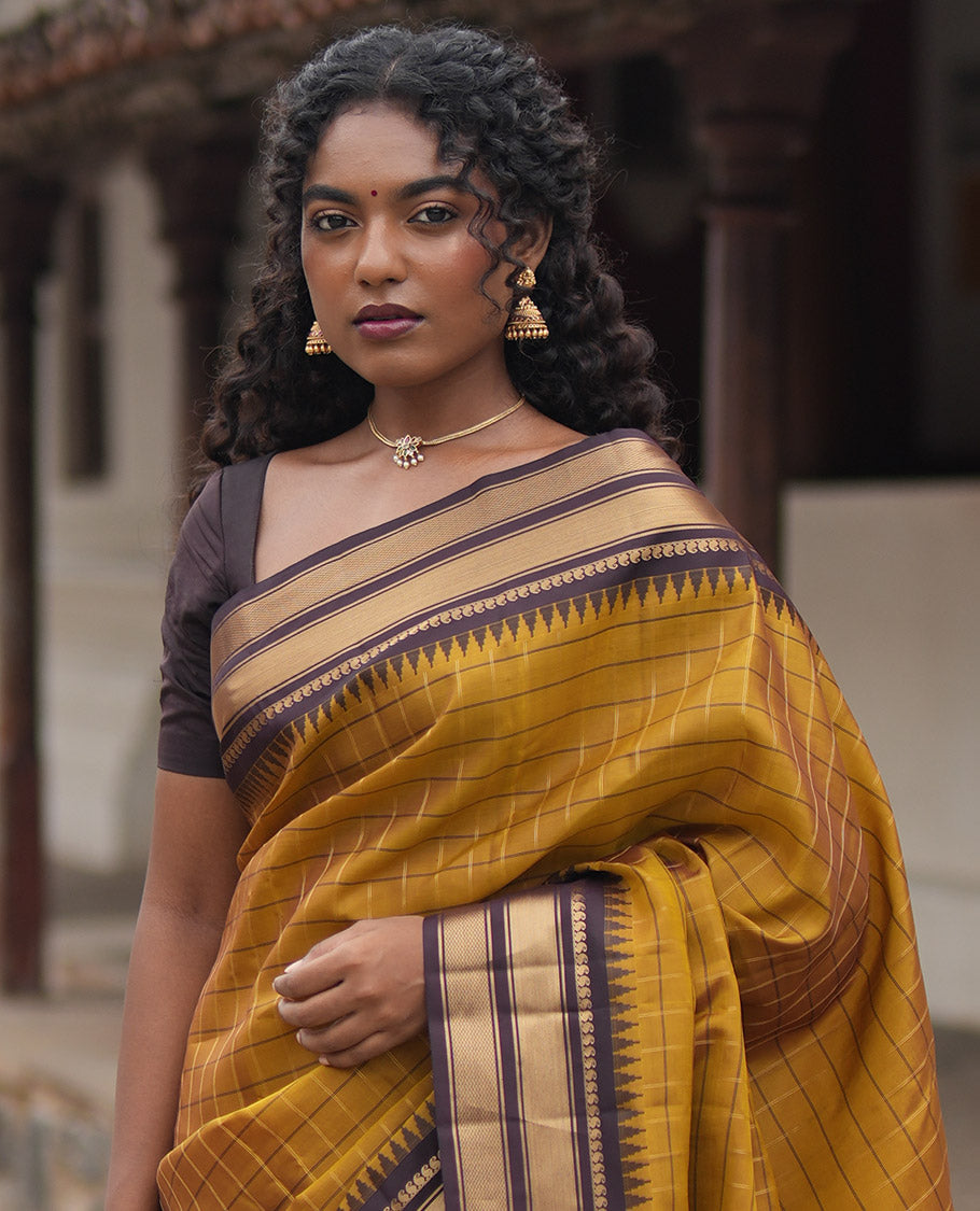 Mehendi Green and Brown Vasundhara Lite Silk Mix Saree, Graced with Checked Design All Over Its Body, Complemented by a Contrast Thazampoo Rekku Border of Manga Mokku, Muthu, and Mayil Kann Designs, Grand Pallu, and Paired with a Contrast Blouse