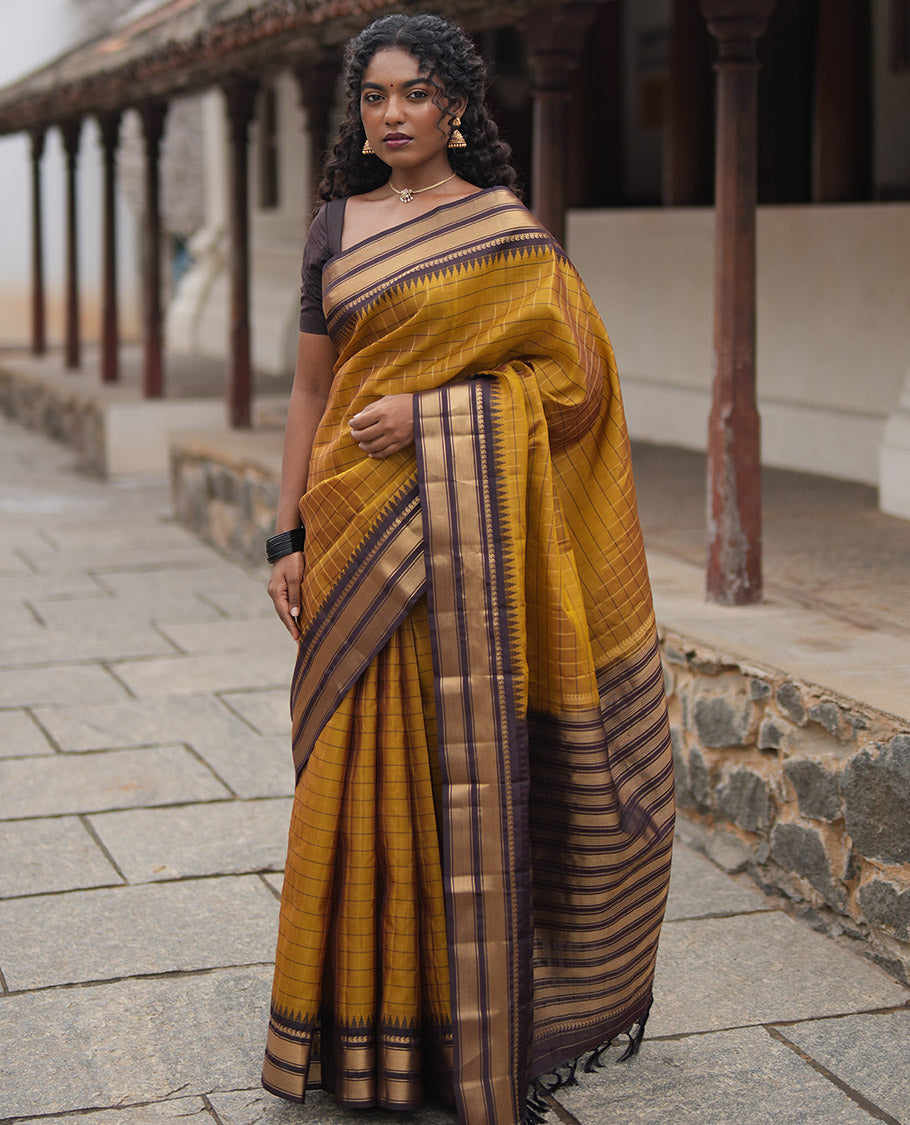 Mehendi Green and Brown Vasundhara Lite Silk Mix Saree, Graced with Checked Design All Over Its Body, Complemented by a Contrast Thazampoo Rekku Border of Manga Mokku, Muthu, and Mayil Kann Designs, Grand Pallu, and Paired with a Contrast Blouse