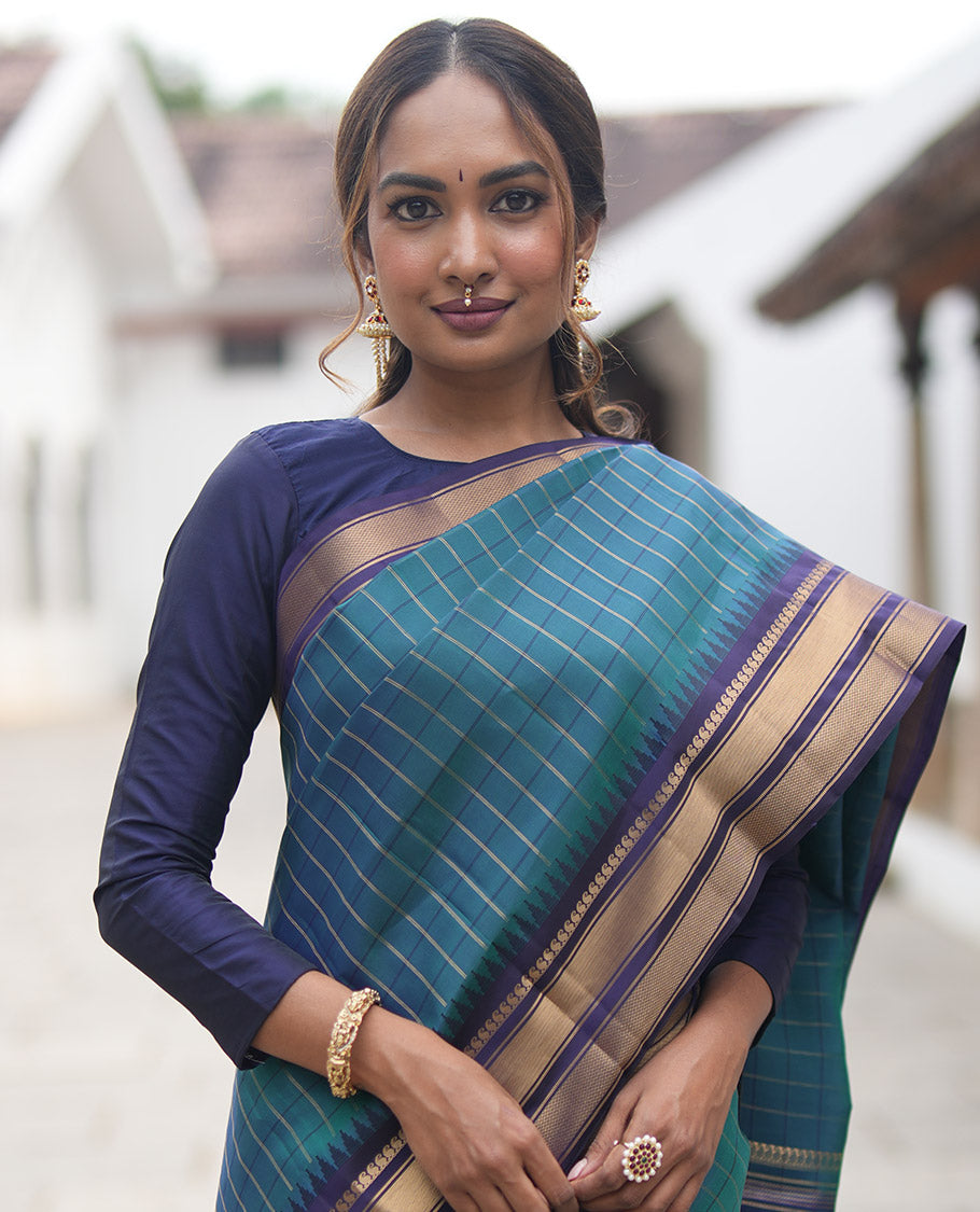 Mayil Color and Navy Blue Vasundhara Lite Silk Mix Saree, Graced with Checked Design All Over Its Body, Complemented by a Contrast Thazampoo Rekku Border of Manga Mokku, Muthu, and Mayil Kann Designs, Grand Pallu, and Paired with a Contrast Blouse