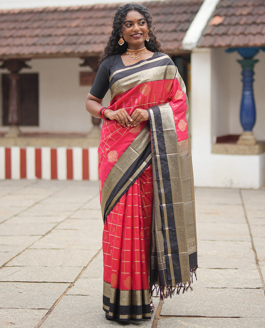 Reddish Orange Budget Silk Saree, Entralled with Jhumka Butta Enclosed Checks On Its Body, Complemented by Contrast Traditional Zari Rettai Pettu Border, Grand Pallu and Paired with a Contrast Blouse