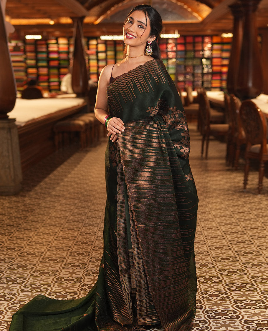 Bottle Green Iconic Blooming Saree Depicts Floral Copper-Thread Embroidery Border, and Matching Blouse