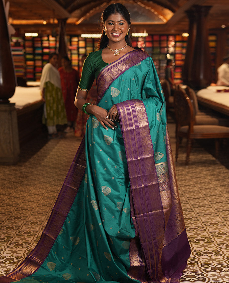 Sapphire Green-Purple Budget Silk Saree, Adorned with Zari Buttas, Complemented by a Contrast Peacock and Elephant Border, Jaal Pallu, and a Contrast Blouse