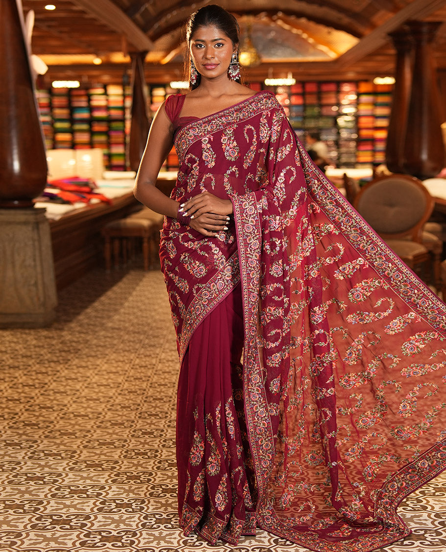 Wine Georgette Designer Saree Features Color-Thread Paisley Embroidery, a Matching Blouse