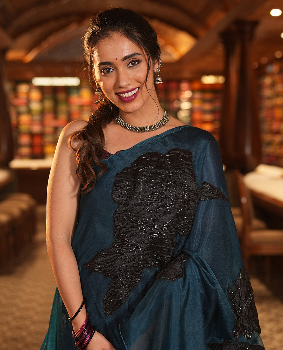 Peacock Blue Turkey Organza Saree Features Floral Applique Embroidery, a Scallop Border, Matching Blouse