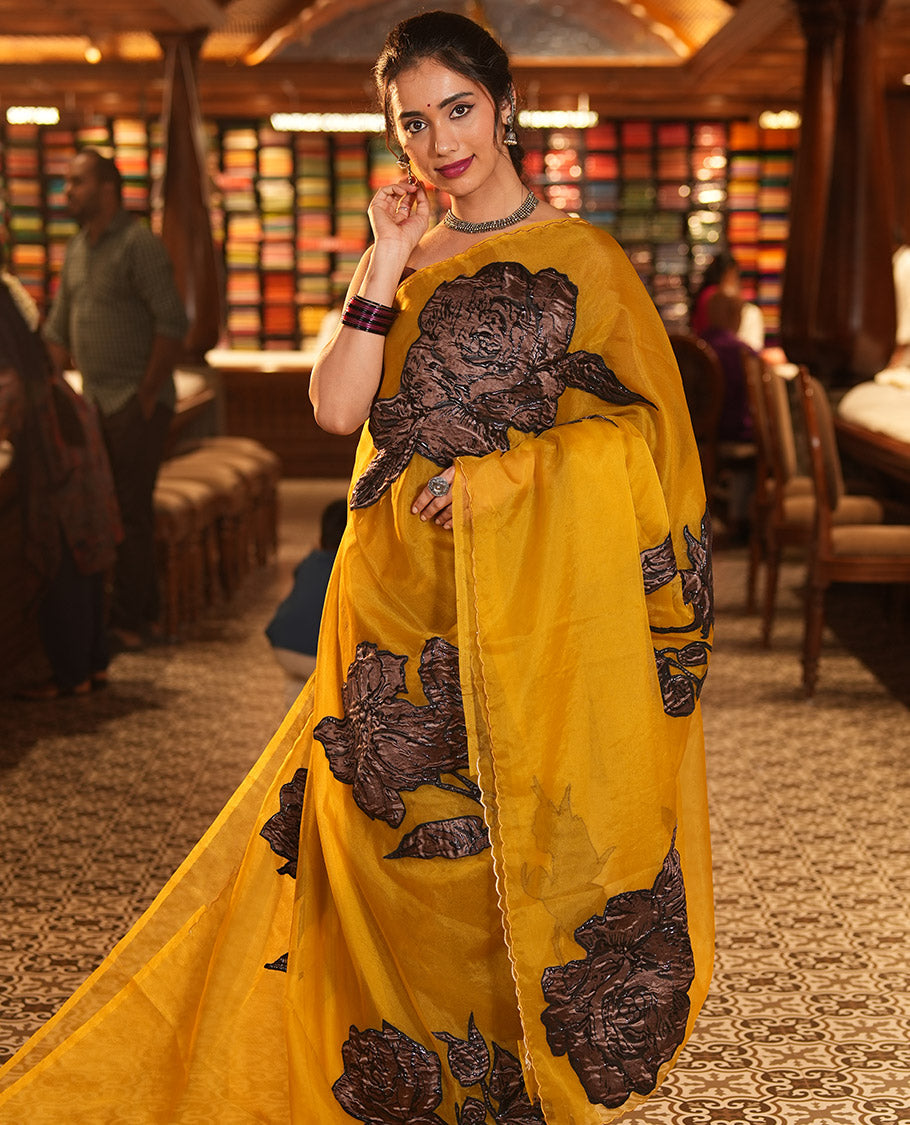 Mustard Turkey Organza Saree Features Rose Floral Applique Embroidery, a Scallop Border, Matching Blouse