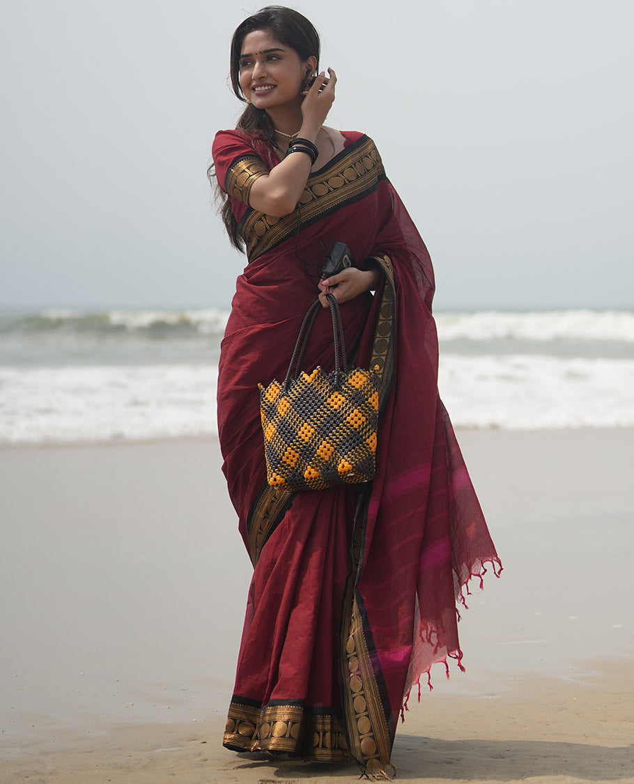 Maroon Plain Chettinad Cotton Saree, Complemented by a Contrast Rudraksham Design Traditional Zari Border, Subtly Striped Pallu, and Paired with a Matching Blouse