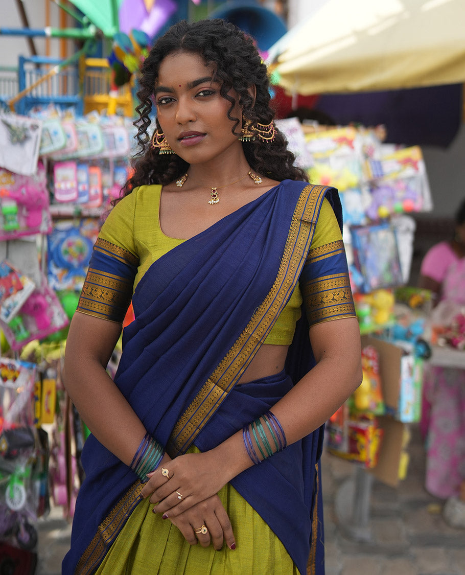 Liril Green-Royal Blue Mercerised Cotton Half-Saree Features Plain Skirt, Contrast Traditional Annam-Motif Border, a Matching Blouse, and Contrast Dhavani