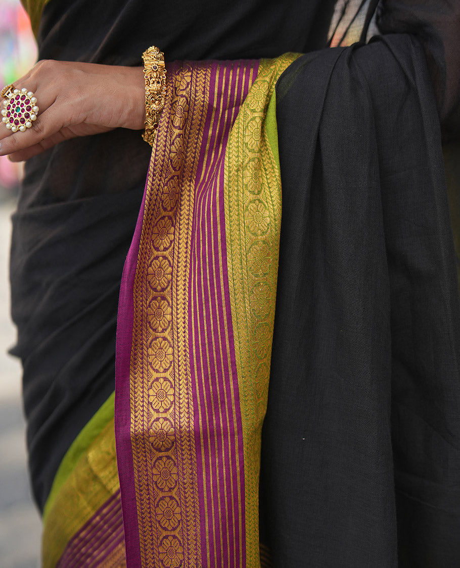 Black Plain Khadi Mul Cotton Saree, Complemented by a Contrast Traditional Zari Border, Striped Pallu, and a Matching Blouse
