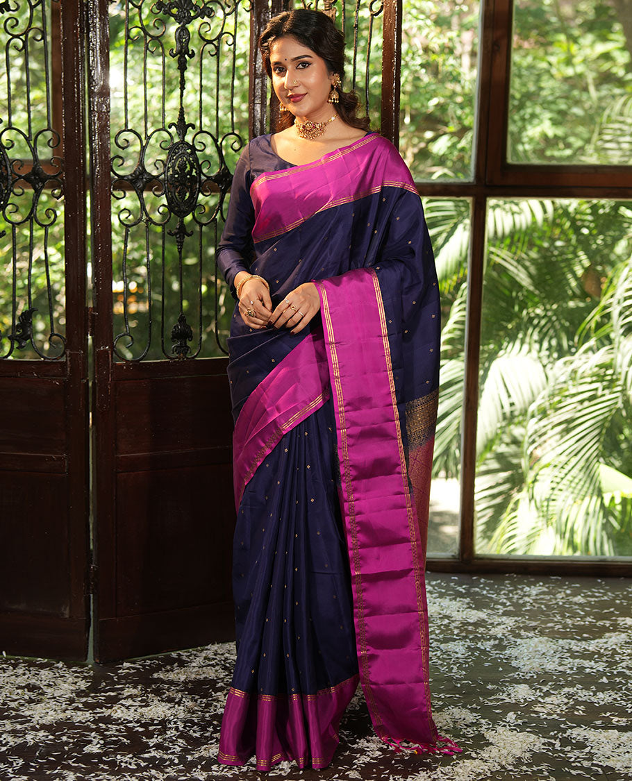 Blue Vasundhara Lite-Silk Mix Saree, Beautifully Decorated with Zari Buttas All Over Its Body, Complemented by Contrast Rettai Pettu Border of Zari Stripes, Pallu Accentuated with Jaal Designs, and Paired with a Contrast Blouse