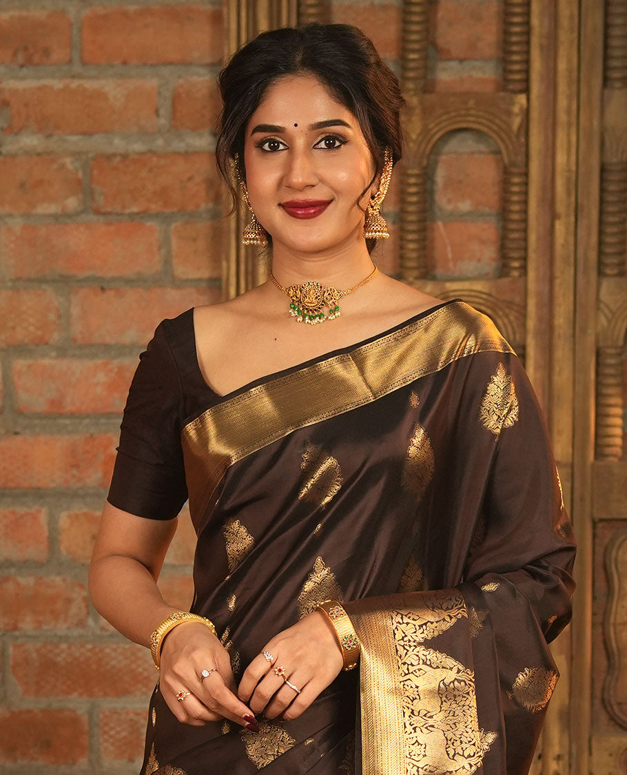 Brown Vasundhara Lite-Silk Mix Saree, Elevated with Zari Buttas All Over Its Body, Highlighted by Zari Border of Neli, Kuyil Kann, Kathir, and Maan Designs, Gracefully Embellished Pallu of Jaal Design, and Paired with a Matching Blouse